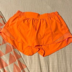 Neon orange lululemon shorts